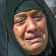 An Iraqi mother expressing American-like grief at the loss of her son.
